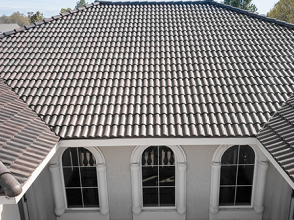 Tile Roofing installed by  Reynolds Roofing, Exteriors & Coating in Marion, IL 
